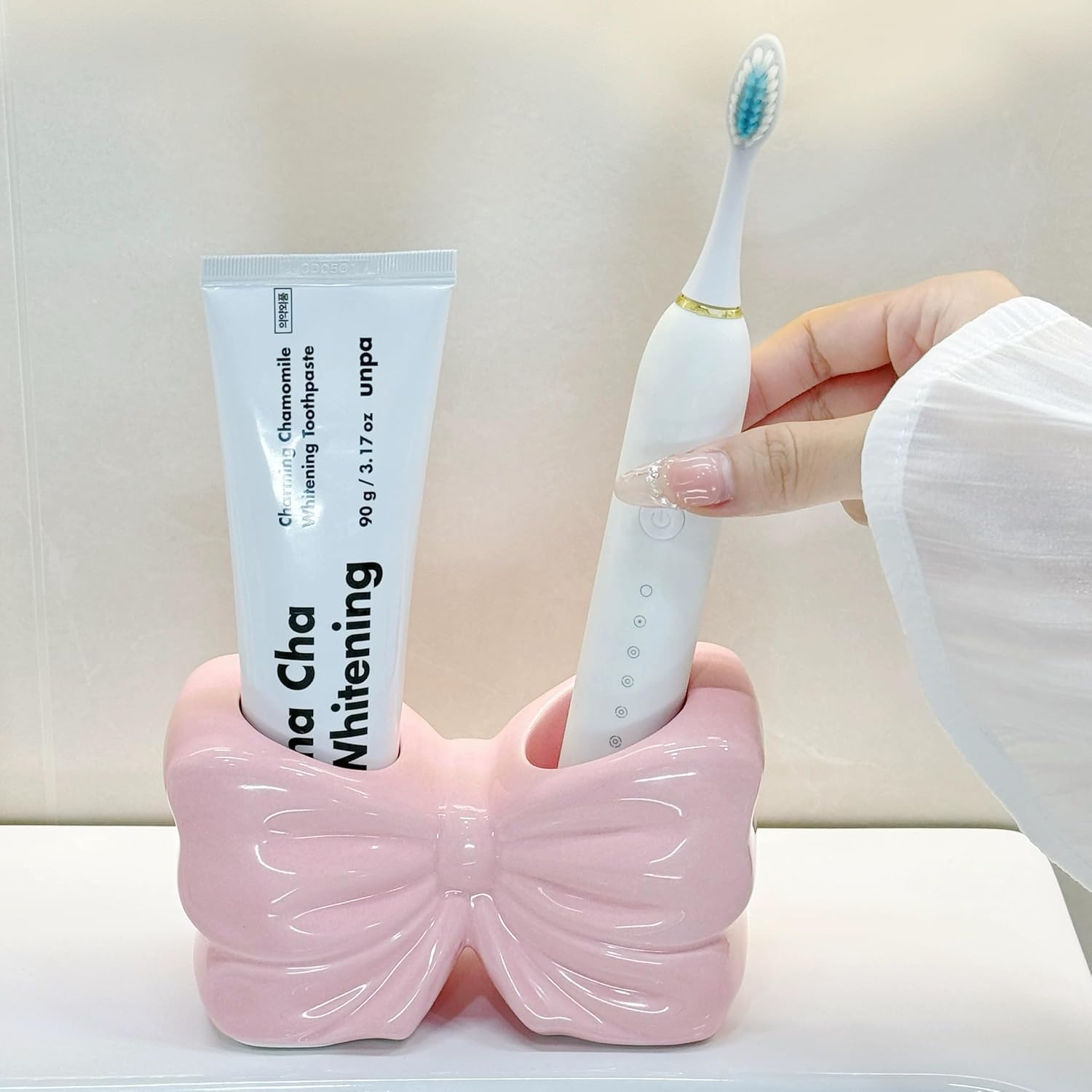 CASTATEO Bow-Shaped Ceramic Toothbrush Holder